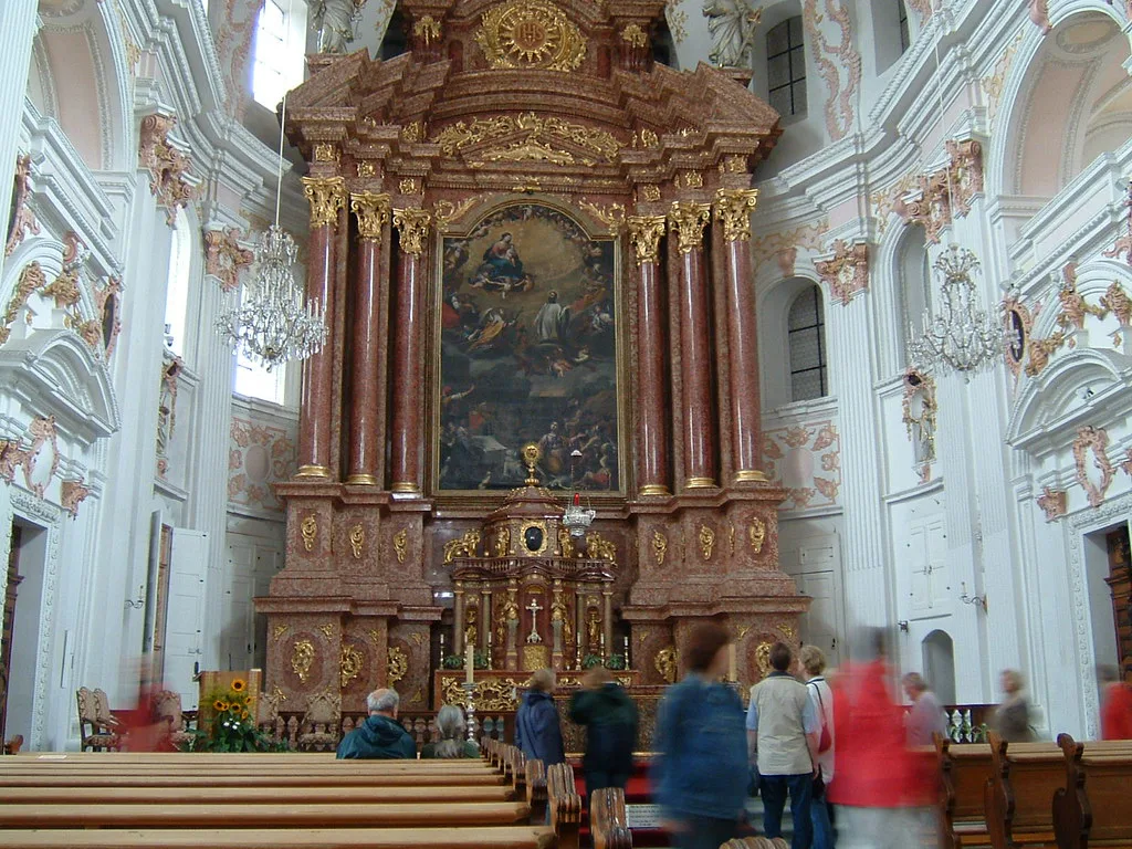 Venue view: the Baroque Jesuit Church (Jesuitenkirche) on the Reuss in Lucerne's old town.